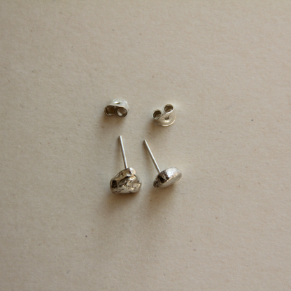 små molten silver studs